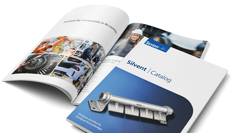 Silvent's catalog showing both the front cover and an open spread from the introduction section.